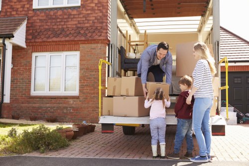 Loaded Greenwich moving truck with boxes and protected furniture