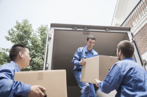 Removal worker checking equipment and route conditions