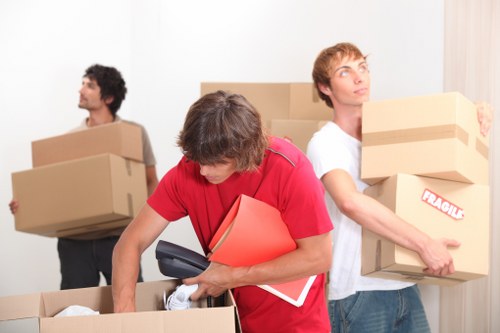 Final moving boxes and furniture delivered during Greenwich removals