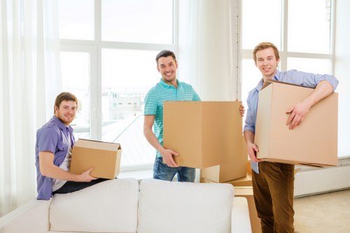 Loading boxes into a moving truck for a Greenwich relocation