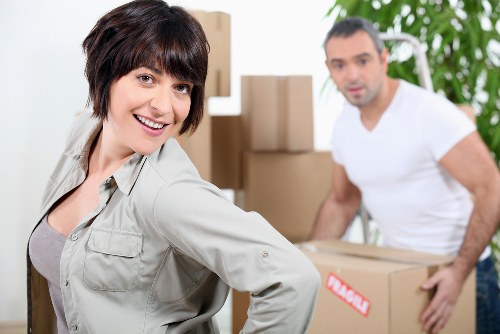 Professional movers loading furniture in Greenwich street